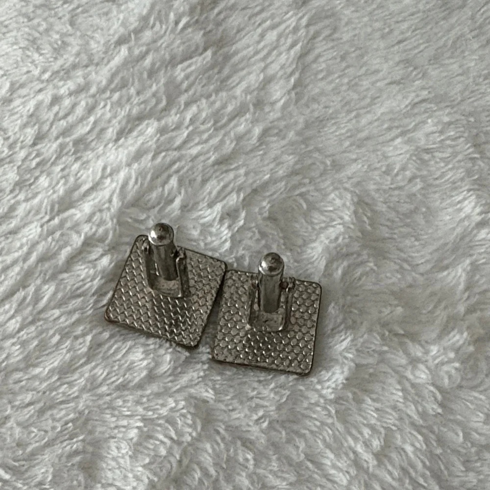 Elegant Silver and Black Cufflinks